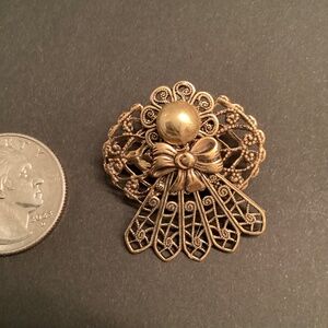 Pretty little filigree  guardian angel pin… hand crafted